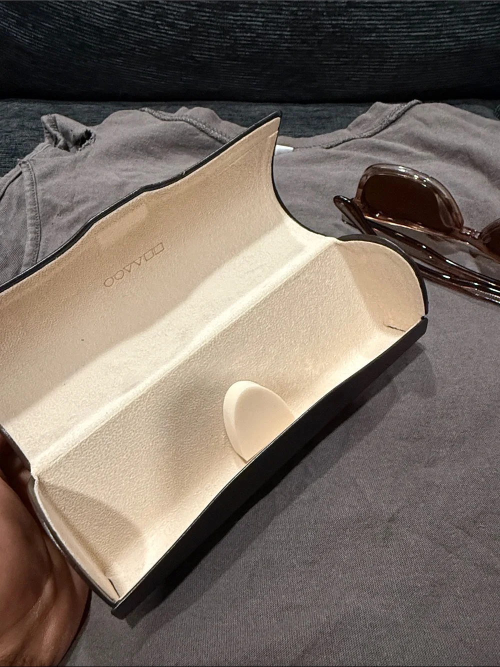 Oliver Peoples Brown Transparent Frame Sunglasses with Brown Lenses.